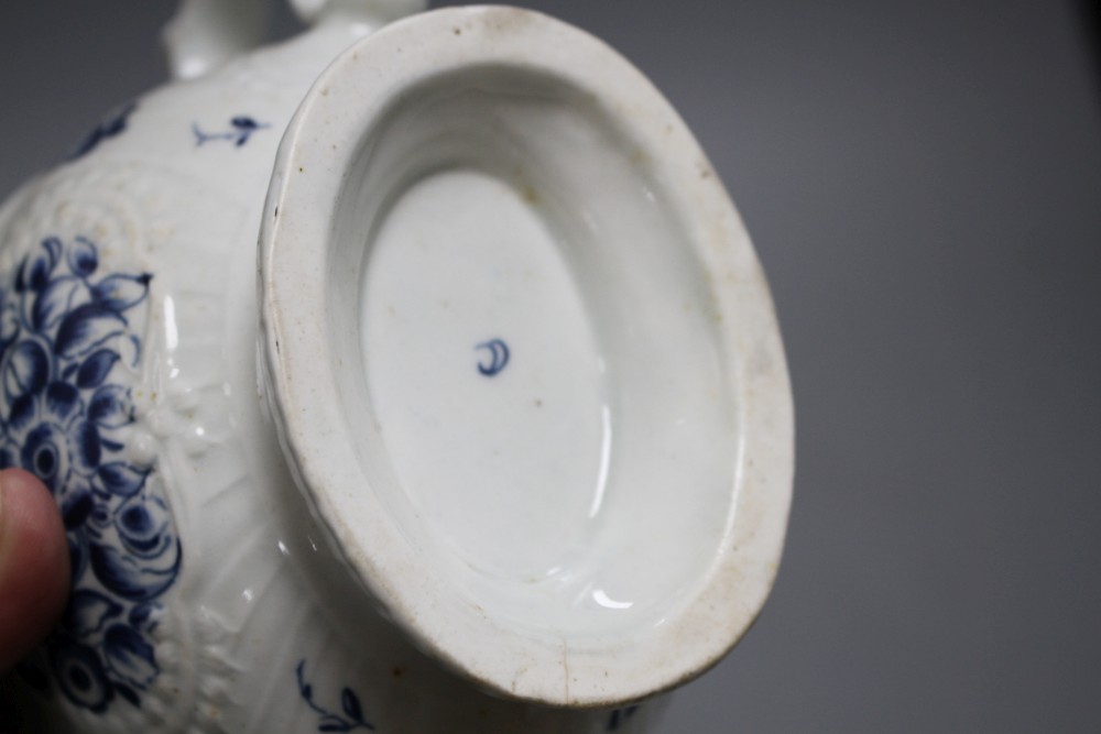 A Lowestoft blue and white sauceboat, c.1770 and two Worcester blue and white sauceboats, c.1758-65,